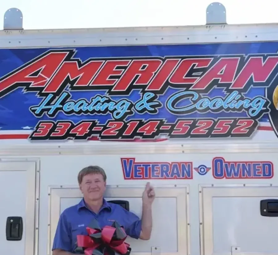 The American Heating & Cooling crew with their service truck in Columbus, GA